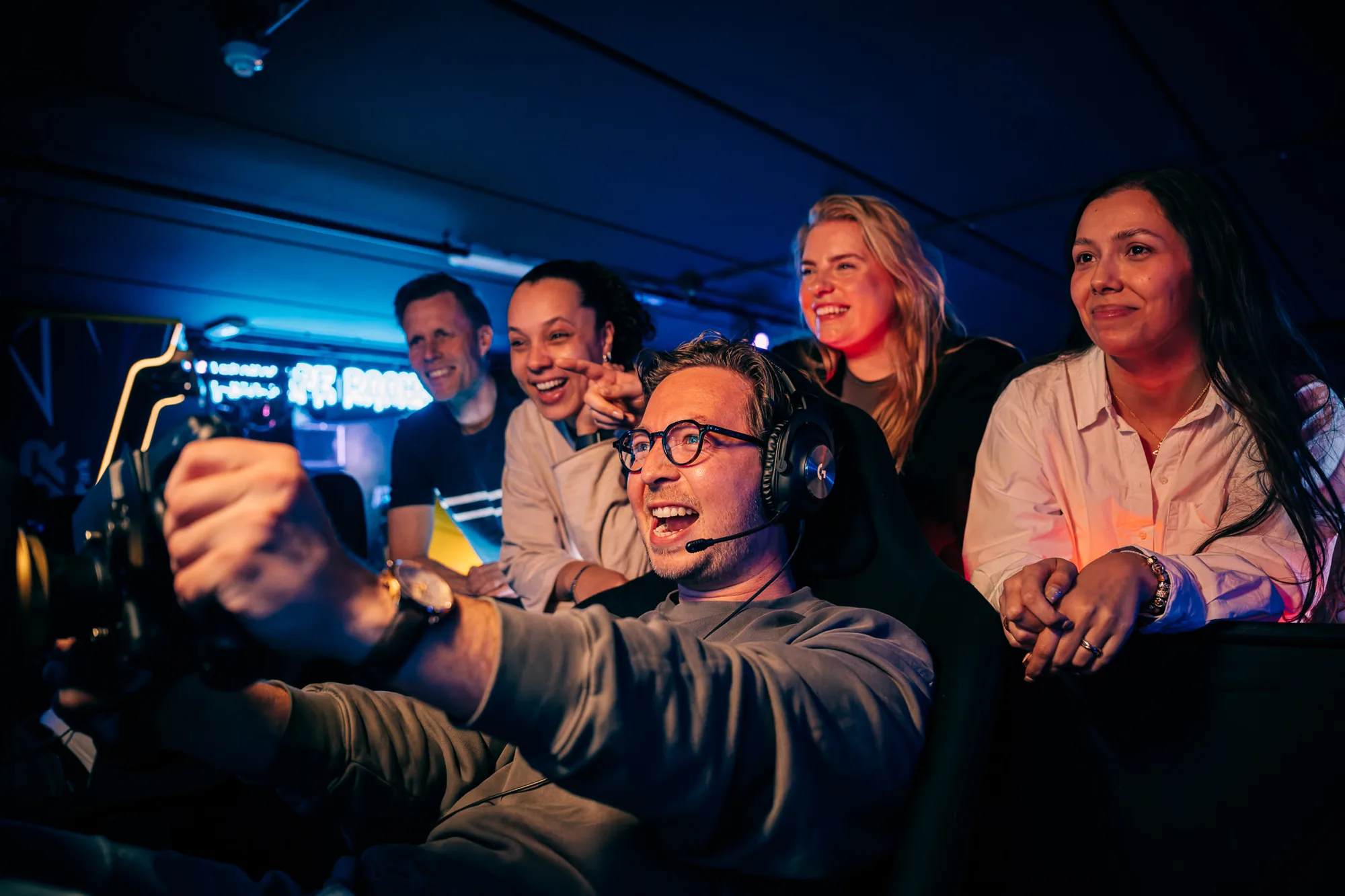 Colleagues on the racing simulators at A'DAM VR